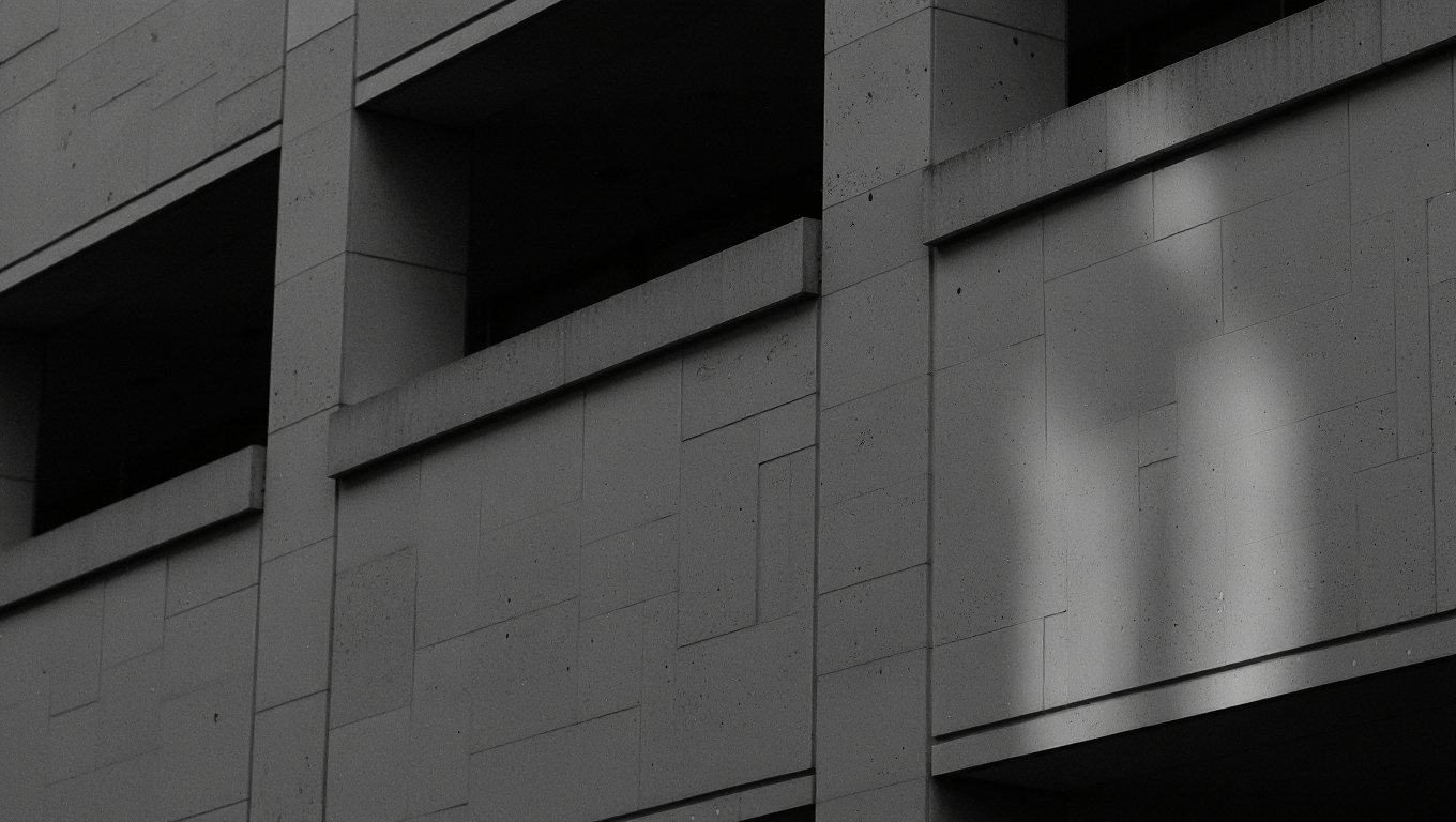 Light and shadow on a sculptural concrete facade