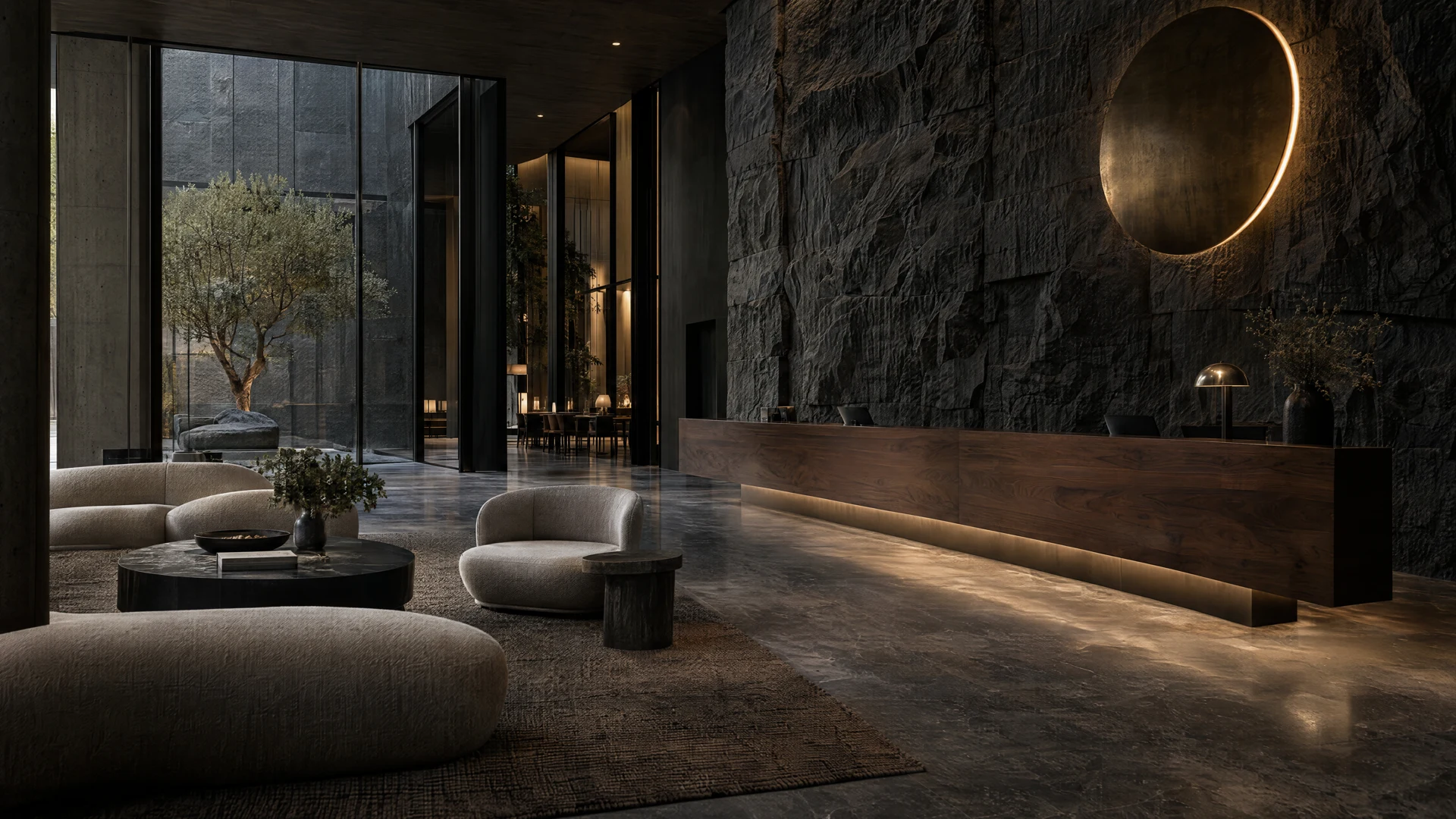 Spacious hotel lobby with warm lighting and calm seating areas
